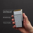 BaBylissPRO METALFX Double Foil Shaver in hand. Features hypoallergenic gold titanium foils, all-metal housing, and 3 hours runtime. Verified by CuratCart.