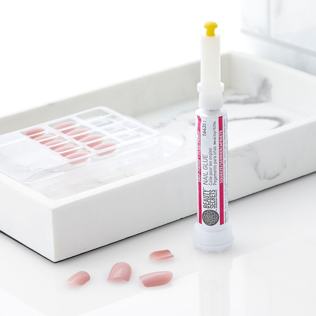 Premium imported Beauty Secrets nail glue offers drip and clog proof application for perfect nails. Ideal for effortless repairs.