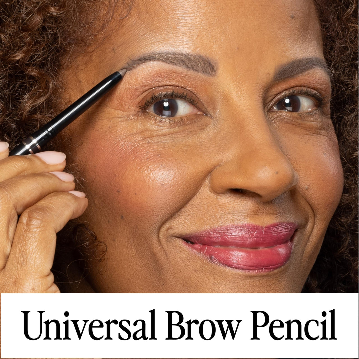 A woman applies Billion Dollar Brows Universal Eyebrow Pencil. Ideal for achieving precise, natural-looking brows.