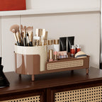 Stylish Booklov rotating makeup organizer with compartments for brushes, palettes, and skincare, enhances clutter-free beauty storage.
