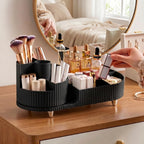 Stylish black rotating makeup organizer holding brushes and cosmetics, perfect for elegant storage. Verified by CuratCart.