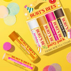 Burt's Bees Garden Party L gift set with four colorful lip balms, featuring birthday cake and strawberry shortcake flavors. Verified by CuratCart.