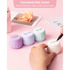 Set of four colorful travel containers labeled for lotion, shampoo, cream, and body wash, ideal for organized travel.