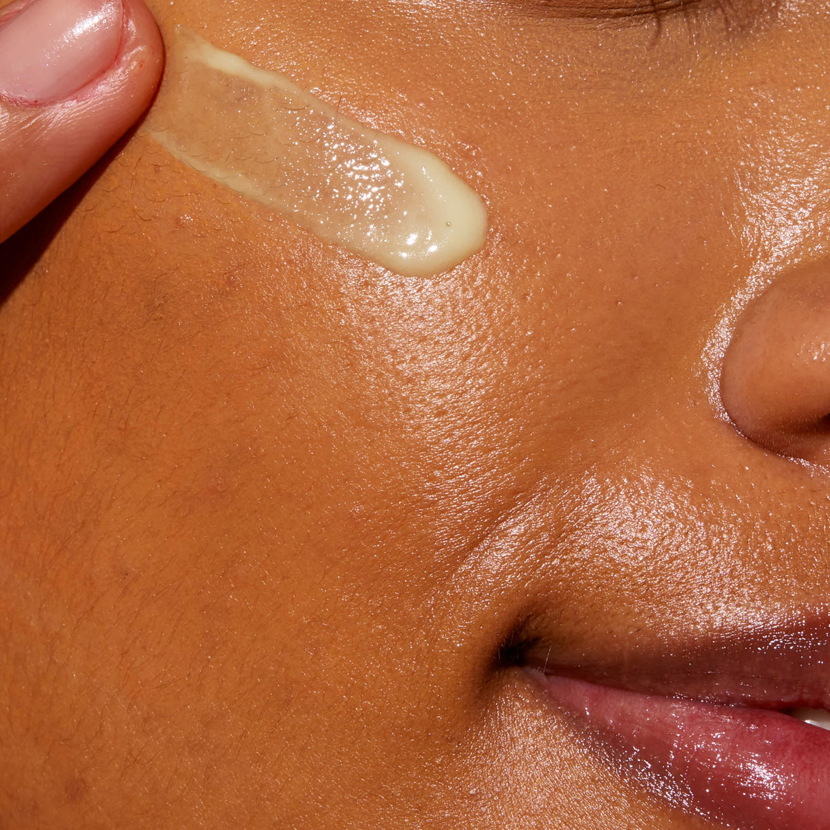 A close-up of a person applying CeraVe Retinol Serum on their face, showcasing its smooth texture. Verified by CuratCart.