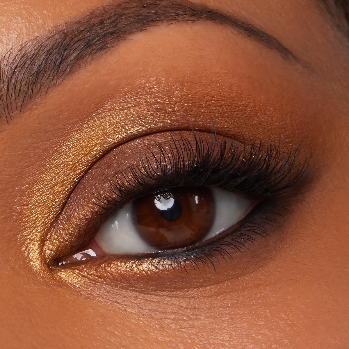Close-up of a bronze and gold eyeshadow look from ColourPop's Stone Cold Fox palette. Order online now, available in India!