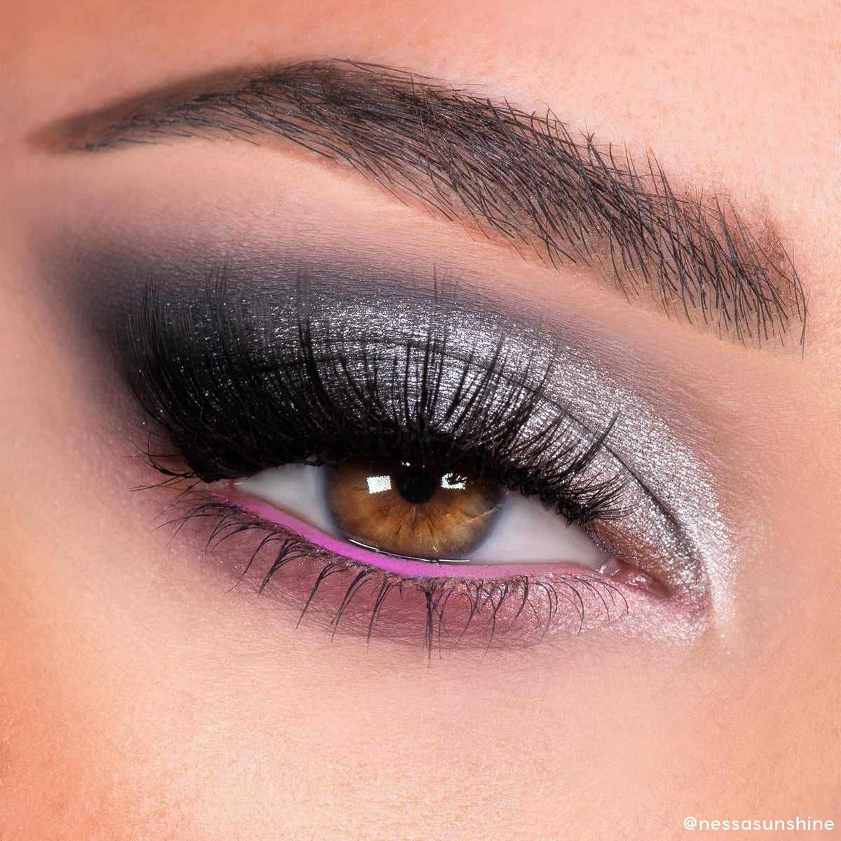 Close-up of a dramatic smoky eye using ColourPop Stone Cold Fox Palette, showcasing shimmering silver and bold contrast.