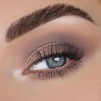 Close-up of an eye featuring a smoky eye makeup look using ColourPop Stone Cold Fox Eyeshadow Palette. Verified by CuratCart.