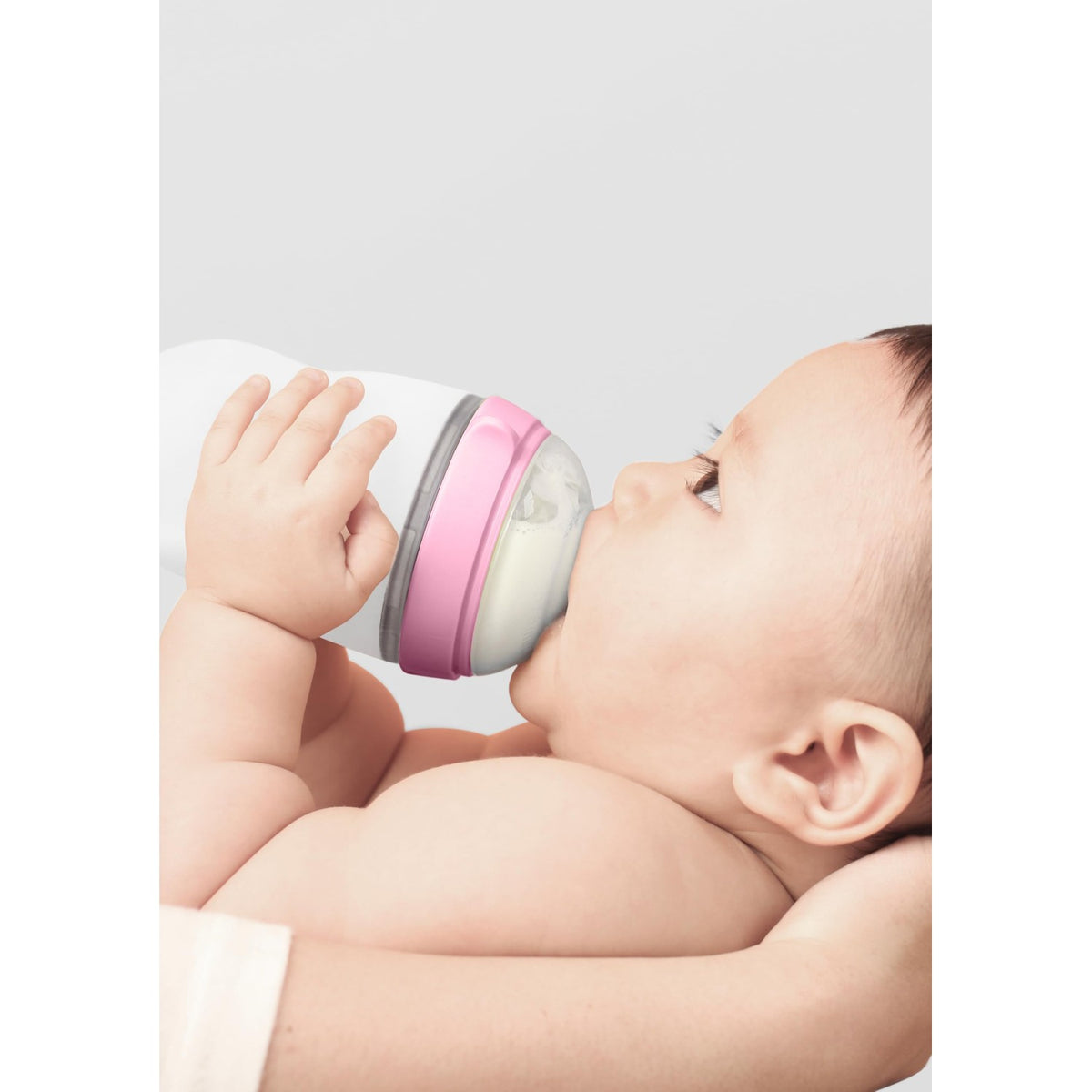 Premium imported Comotomo Baby Bottle in use, designed for easy transition from breastfeeding.