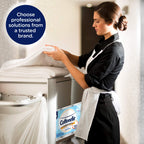 Cottonelle Professional Toilet Paper showcased by a staff member, ensuring 100% authentic quality, available at Curat Cart.