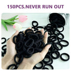 150 black hair ties in a hand, perfect for daily use, ensuring no damage. Verified by CuratCart for quality assurance.