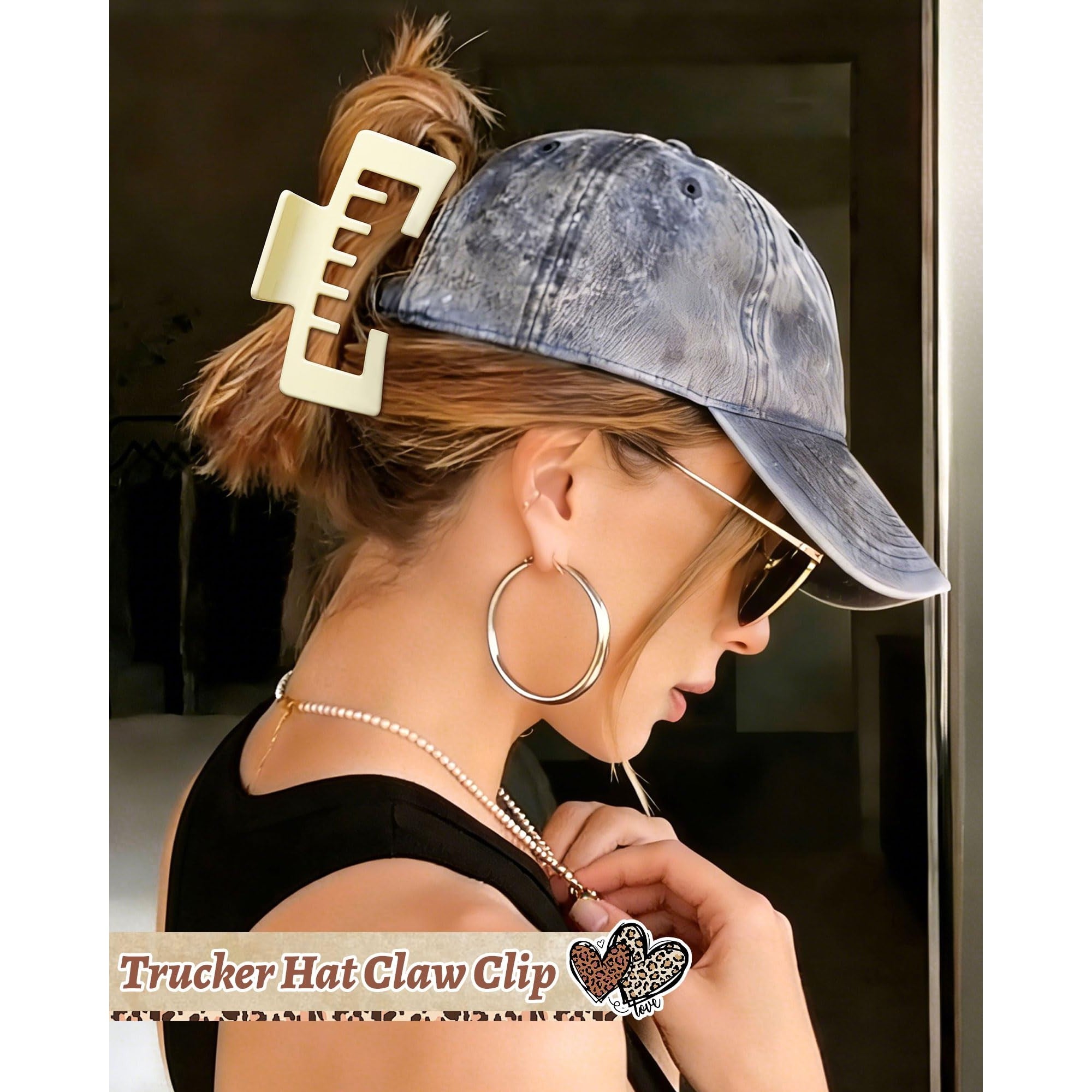 A chic claw clip designed to hold ponytails comfortably under baseball caps, enhancing style and functionality.