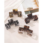 Four stylish claw clips for holding hair under a baseball cap. Order online for quick delivery in India.