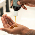 Dermazen Scalp Therapy Shampoo pouring into hand, perfect for daily use. Elevate your hair care routine with Curat Cart.