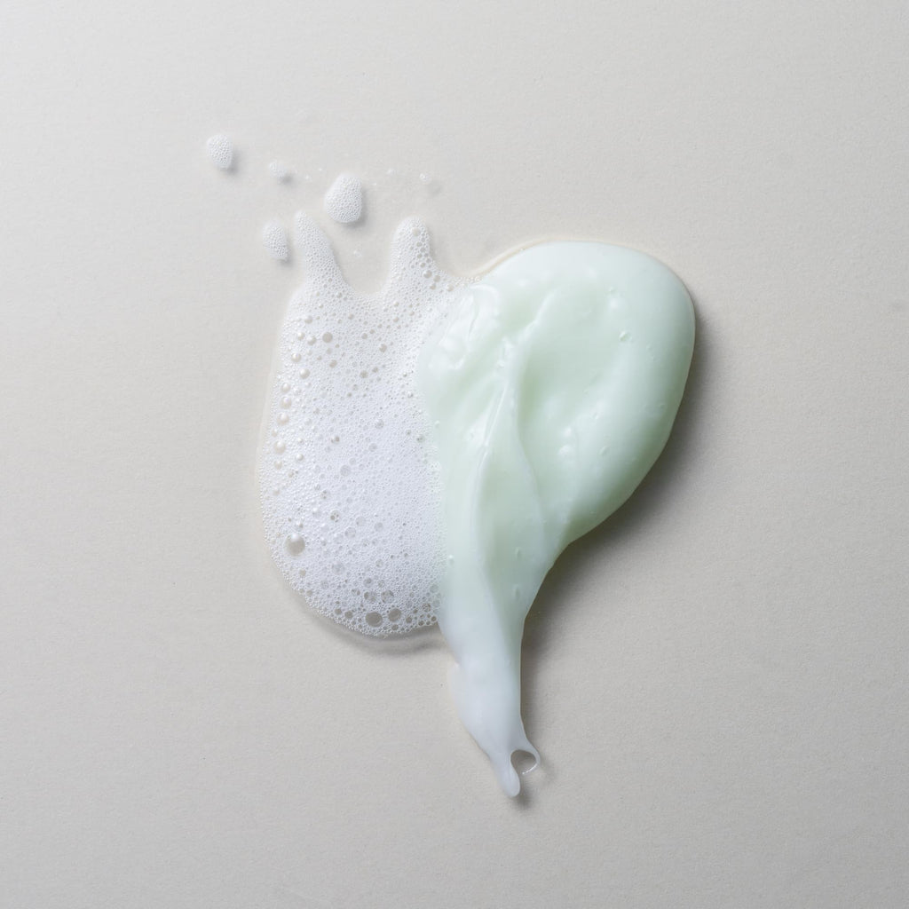 Premium imported Divi volumizing shampoo and conditioner, featuring a creamy texture and soft foam, ideal for fuller hair.