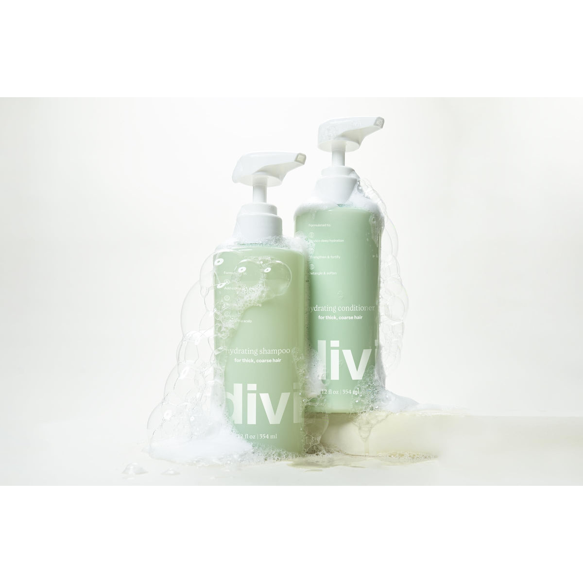 Original Divi Volumizing Shampoo and Conditioner Set, featuring elegant packaging with bubbles for hydration.