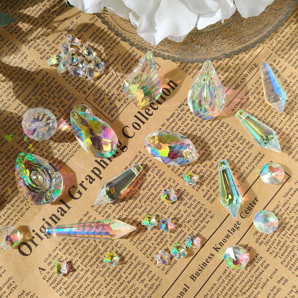 Vibrant suncatcher kit crystals displayed on textured paper, perfect for arts and crafts. Available at Curat Cart.