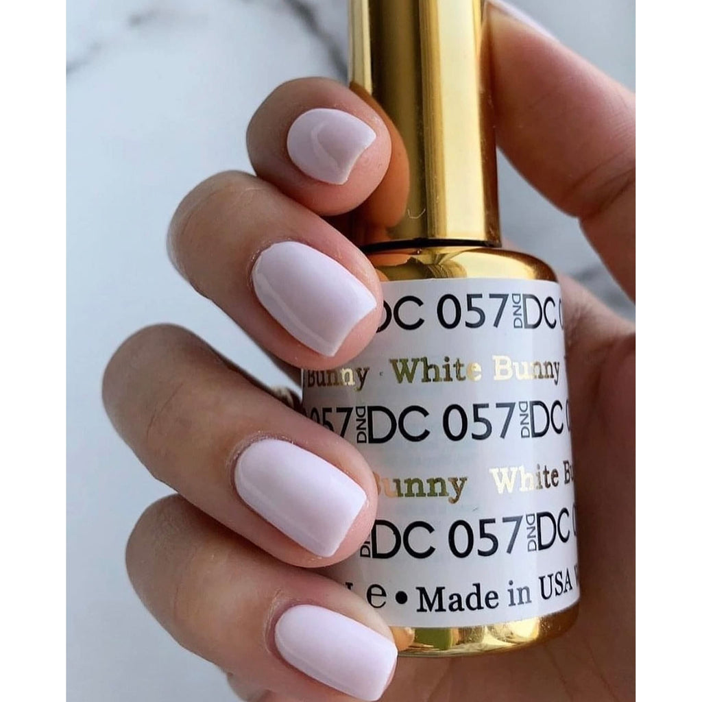 Authentic DND Gel Nail Polish in White, showcasing a smooth application on perfectly manicured nails. Made in USA.
