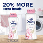 Discover Downy Light Scent Booster Beads, featuring 20% more product for an exclusive fragrance experience, specially curated by Curat Cart.