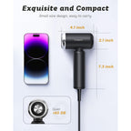 Portable mini hair dryer with dual voltage. Compact design, 4.1 x 2.1 x 7.3 inches, operates quietly under 60 dB.