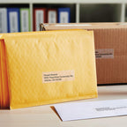 Premium import DYMO LabelWriter 450 Twin Turbo labels on envelopes, showcasing efficient printing at Curat Cart.