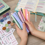 Explore the exclusive Esther Bible Journaling Kit by Curat Cart, featuring vibrant pens, stickers, and decorative elements.