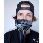 Framar Family Hair Color Brush Set features durable brushes held by an enthusiastic model, perfect for vivid at-home coloring.