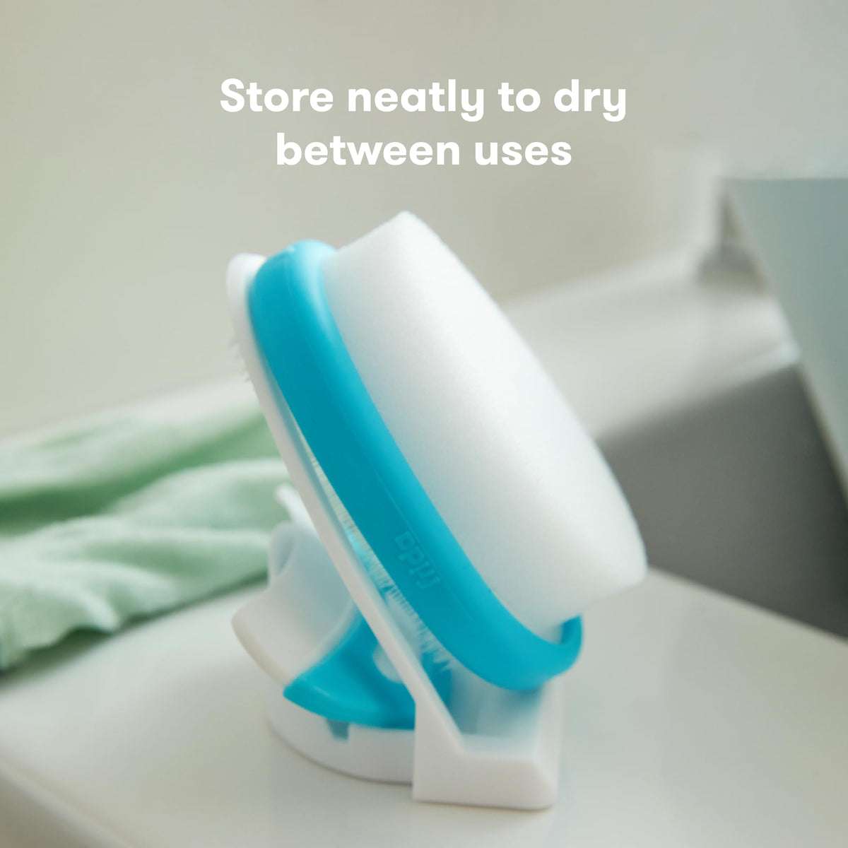 Frida Baby Cradle Cap System displayed, featuring a blue and white design for effective cradle cap care. Original packaging included.