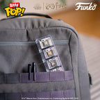 Funko Bitty POP! 4 Pack featuring Harry Potter characters, securely packed in a stylish gray backpack. Verified by CuratCart.
