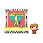 Funko Bitty POP! figure from BTS's Dynamite, standing next to a vibrant stage backdrop. Verified by CuratCart.