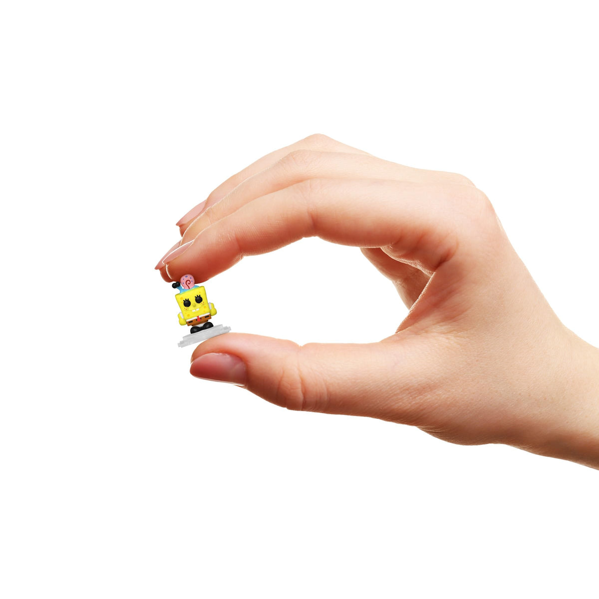 100% authentic Funko Bitty POP! Town SpongeBob SquareP figure, held in hand, perfect for collectors and fans.