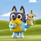 Premium imported Funko POP! Bluey figure holding a toy, perfect for fans of the beloved animated series.