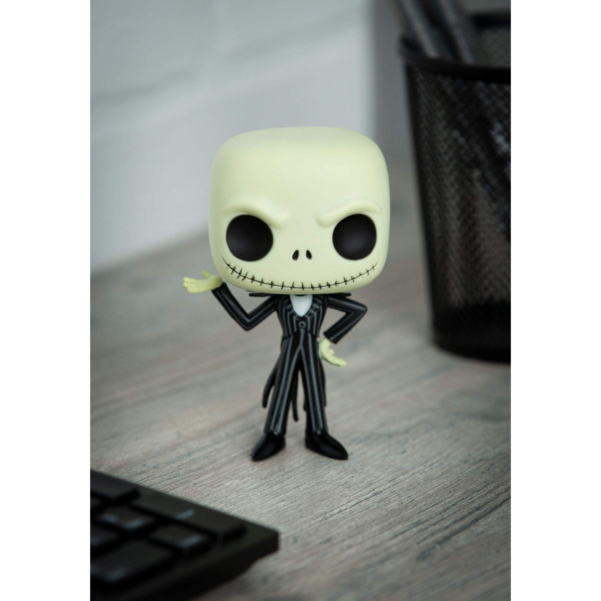 Authentic Funko Pop! figure of Jack Skellington from The Nightmare Before Christmas, featuring his signature striped suit.