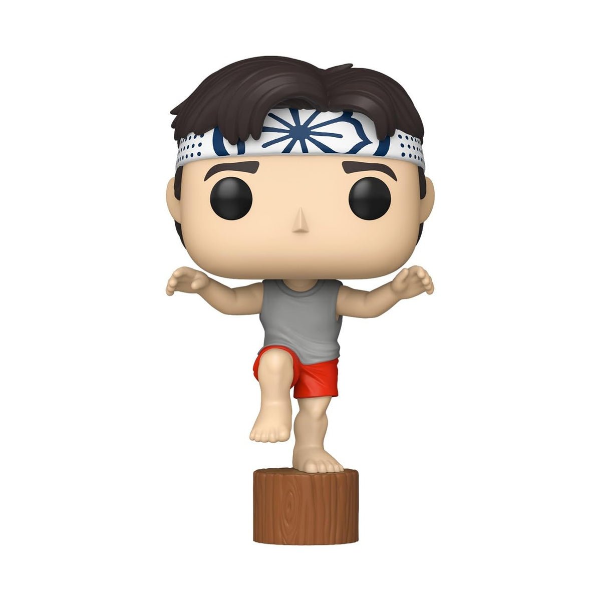 Funko Pop! figure of Daniel from Karate Kid, in a karate pose on a wooden base. Order online today and enjoy fast shipping!