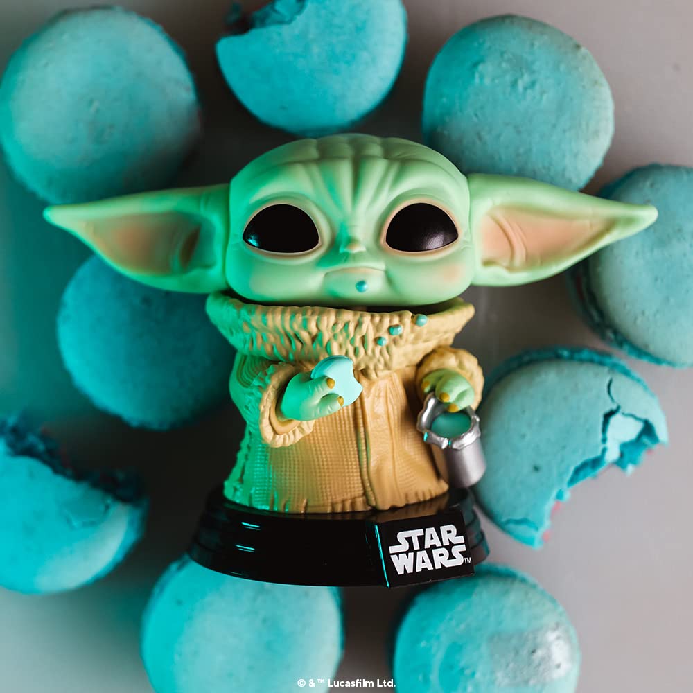 Premium imported Funko POP! Star Wars figurine of Baby Yoda surrounded by blue macaroons, perfect for collectors.