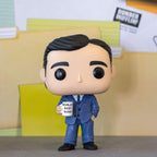 Authentic Funko POP! figure of Michael Scott from The Office, holding a 'World's Best Boss' mug in a suit.