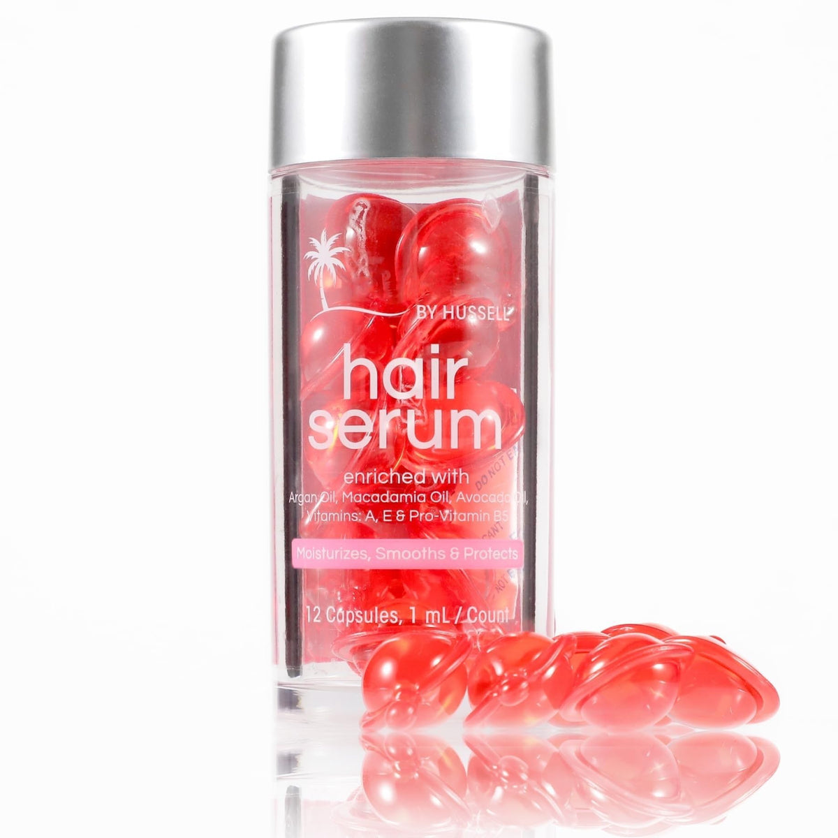 Premium imported hair oil capsules enriched with vitamins for smooth, healthy hair. Ideal for daily nourishment.
