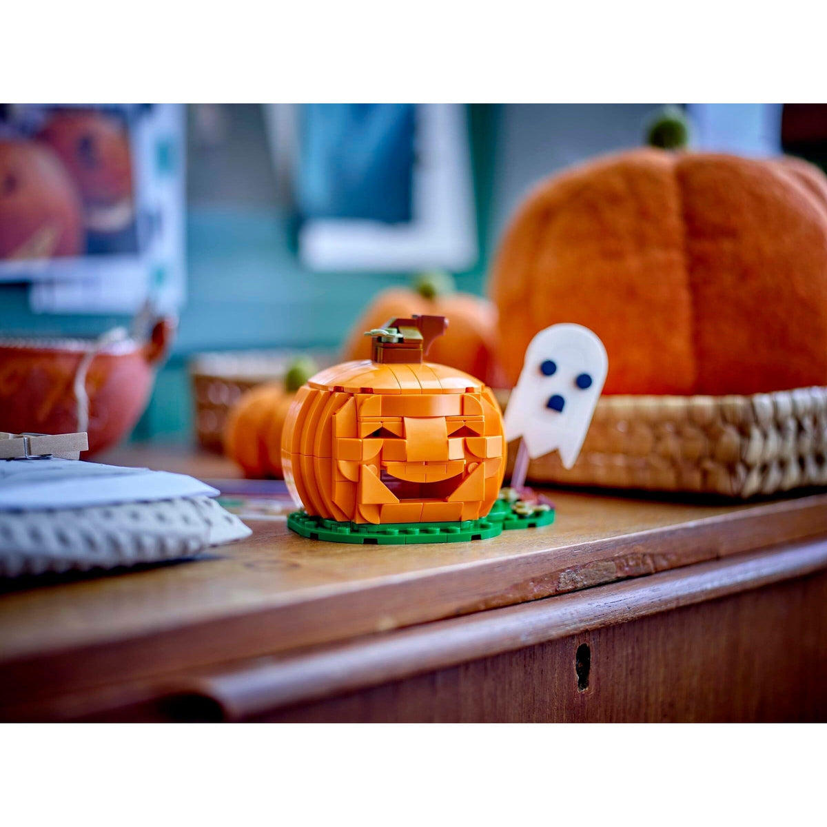 Celebrate Halloween with this premium imported Lego Creator pumpkin set featuring a smiling jack-o'-lantern and ghost.