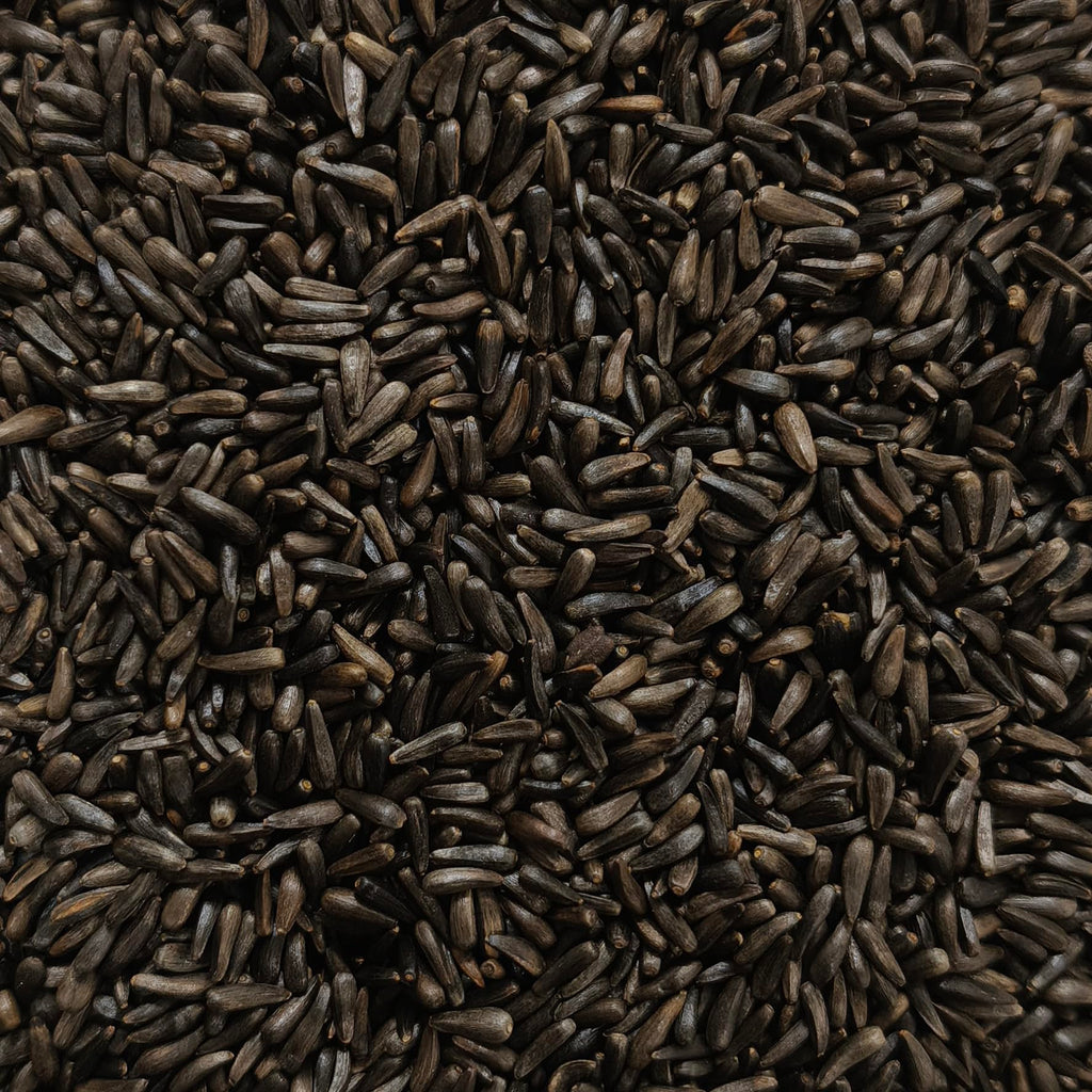 Premium Happy Wings Thistle Seed Bird Food in high-quality packaging, perfect for attracting birds. Available at Curat Cart.