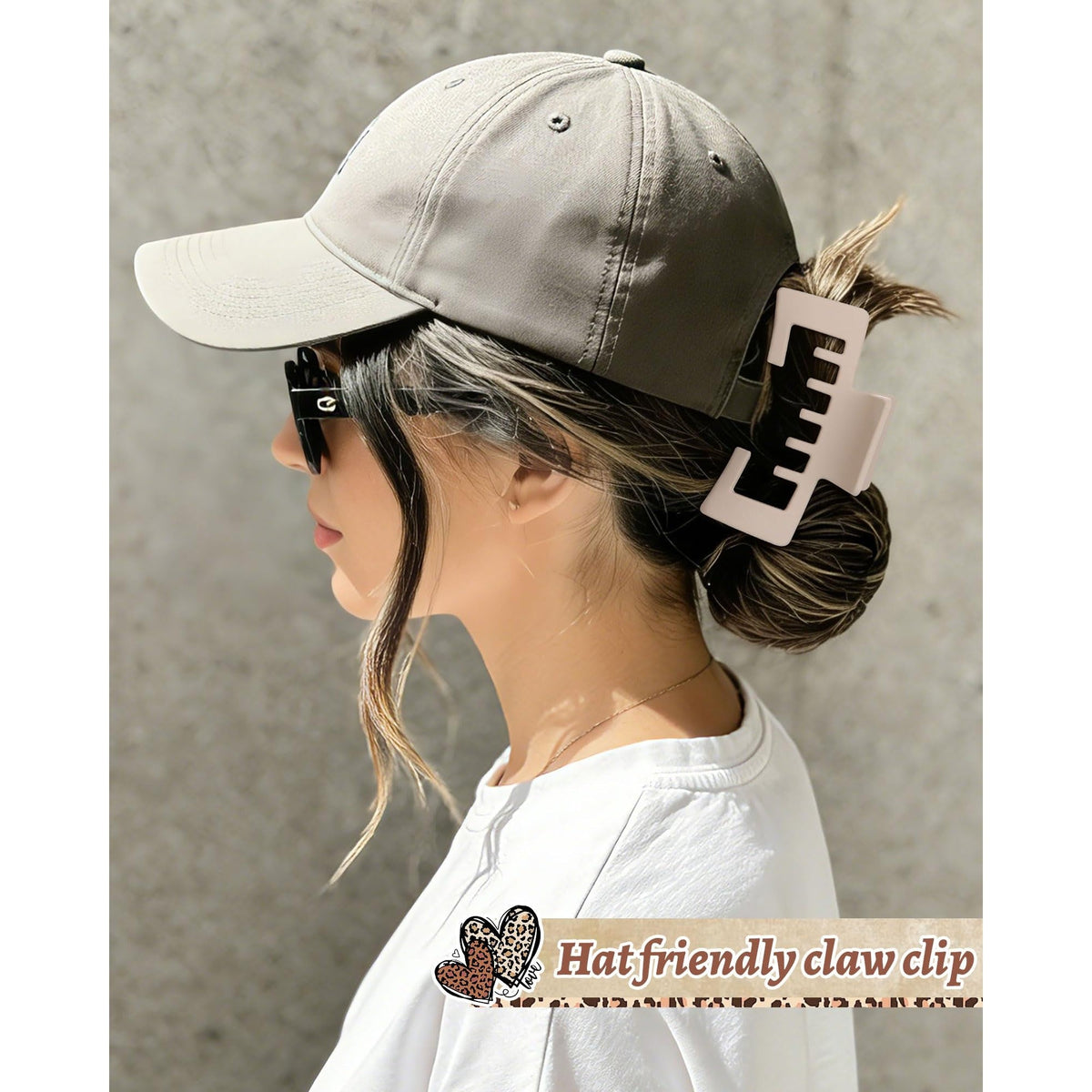 Stylish claw clip secured in hair, perfect for wearing with baseball caps. Verified by CuratCart for quality and trust.