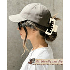 Stylish claw clip designed for baseball caps, perfect for effortless hair styling. Available online, order yours today!