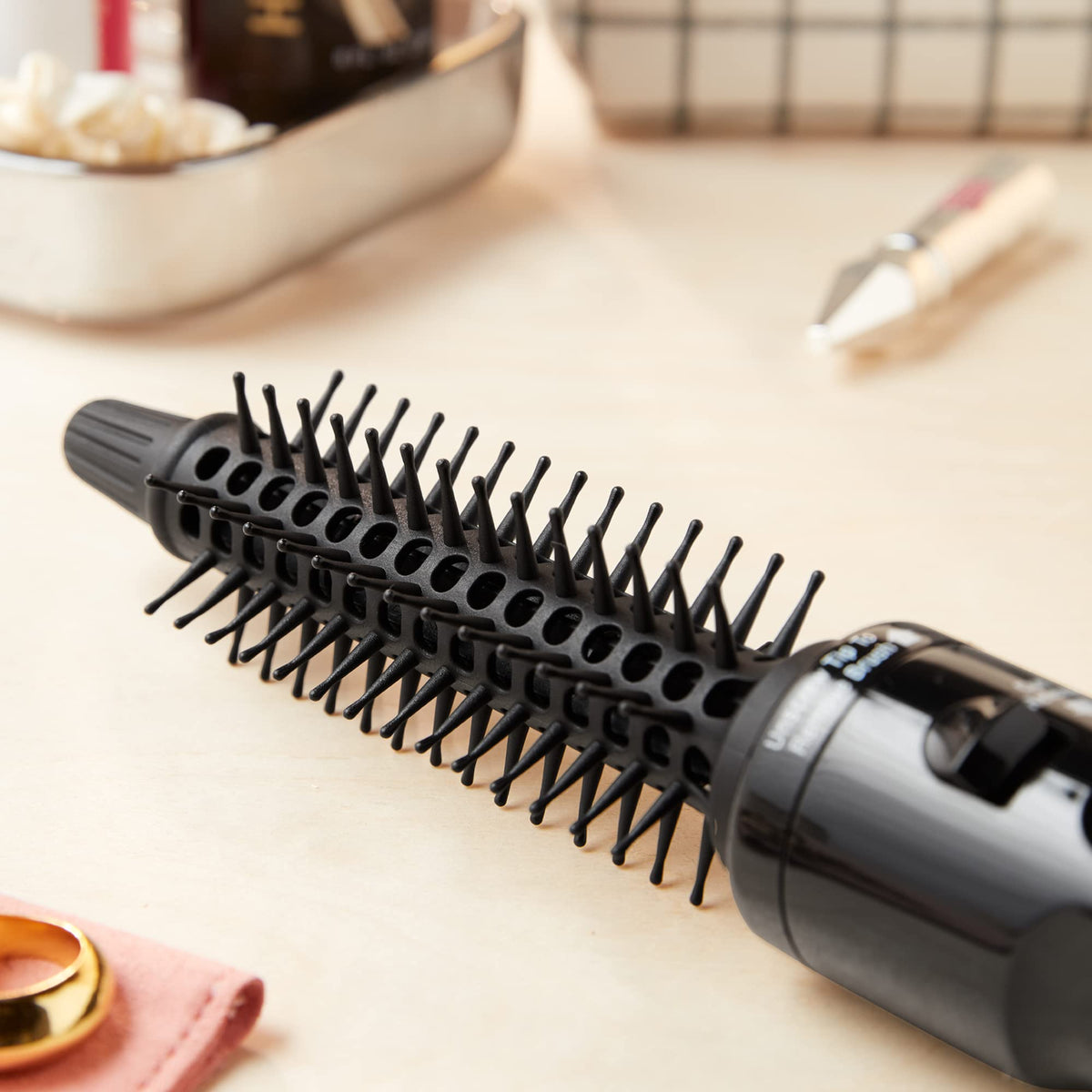 Hot Tools Pro Artist Hot Air Styling Brush features bristles for easy styling. Available online for ordering.