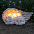 Premium imported iHeartDogs Guardian Angel Solar Light, featuring a serene sleeping dog under angel wings, perfect for outdoor decor. Available at Curat Cart.