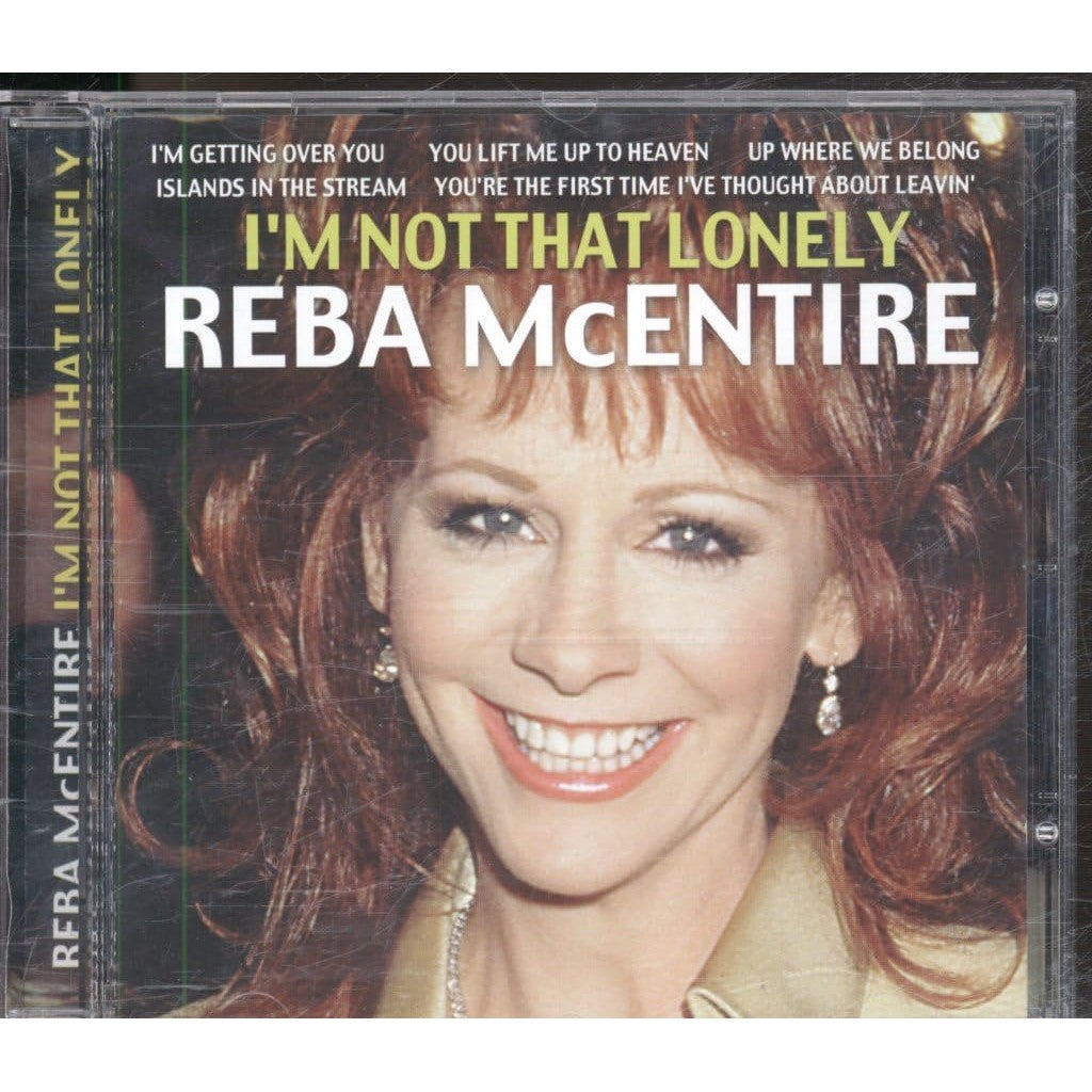 Authentic Reba McEntire album 'I'm Not That Lonely' featuring her smiling portrait and song titles.