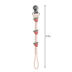 Discover the Itzy Ritzy Silicone Pacifier Clip, a premium import with fun strawberry design, available at Curat Cart.