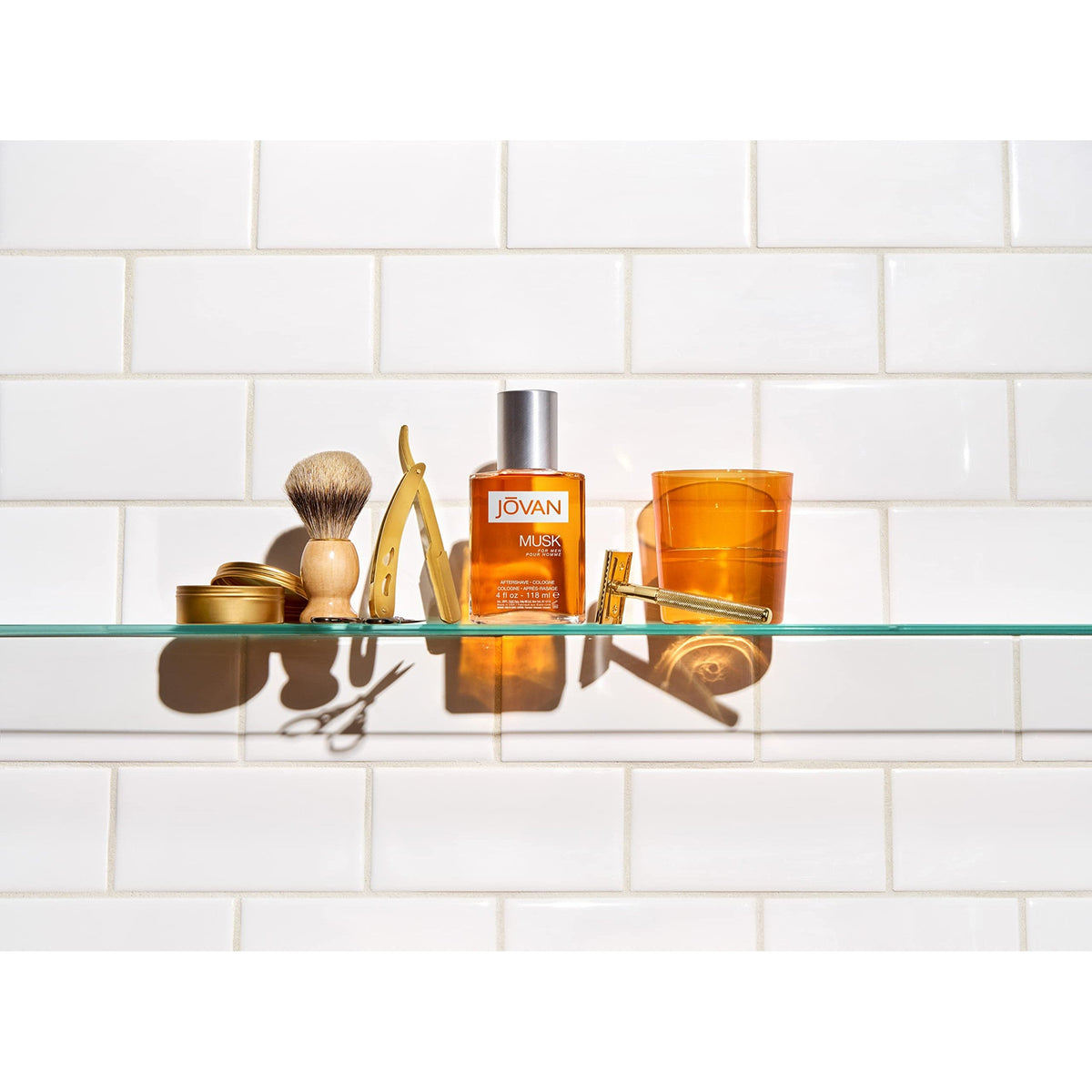 Premium imported Jovan Musk for Men, featuring a fresh scent alongside grooming essentials on a stylish display.