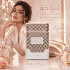 Khadlaj Shiyaaka Snow perfume bottle, showcasing a luxurious design. Available in India. Order online now!