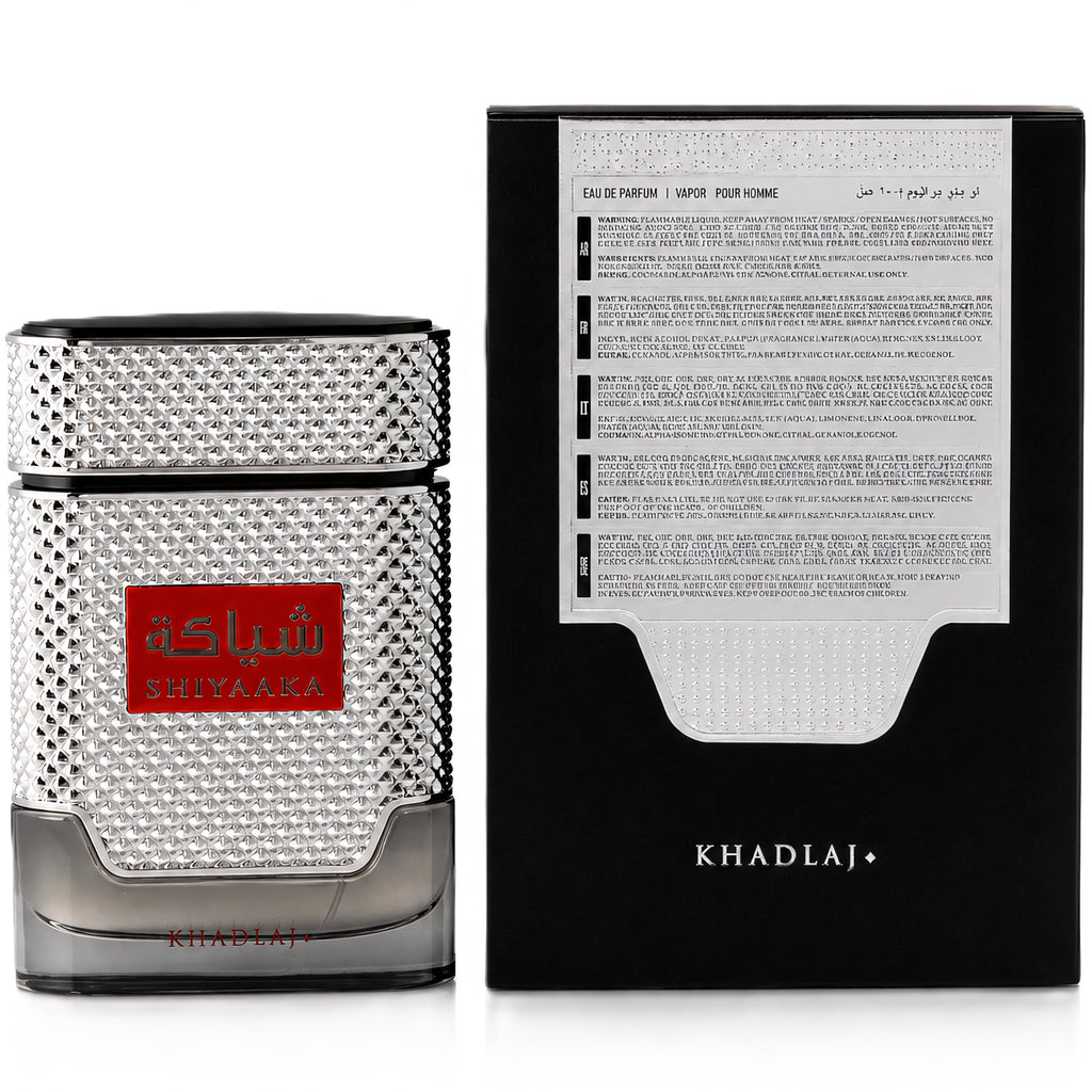 Khadlaj Shiyaaka Snow perfume in textured bottle with luxurious packaging. Citrus and woody fragrance designed for men.