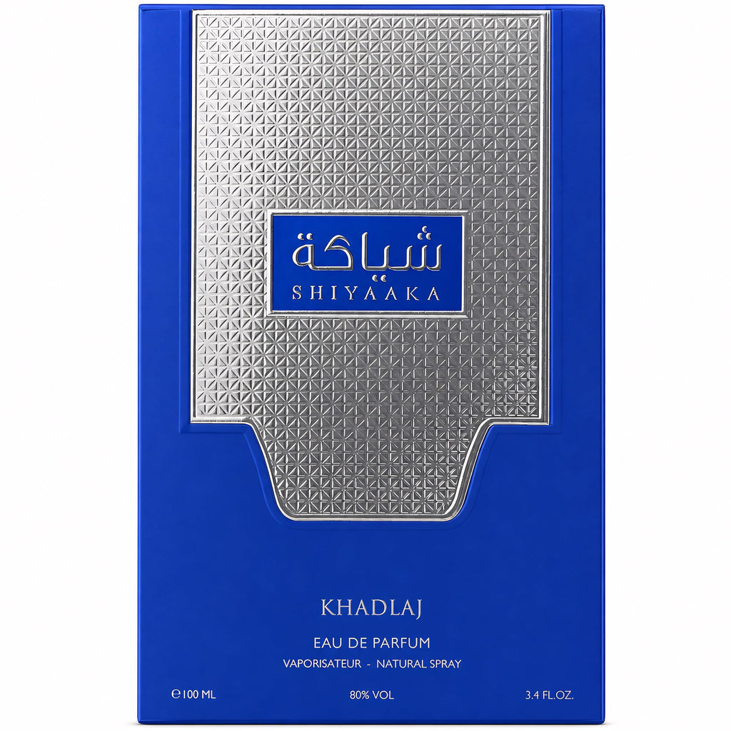 Khadlaj Shiyaaka Snow, a premium citrusy and woody fragrance in an elegant blue box, 100ml natural spray.