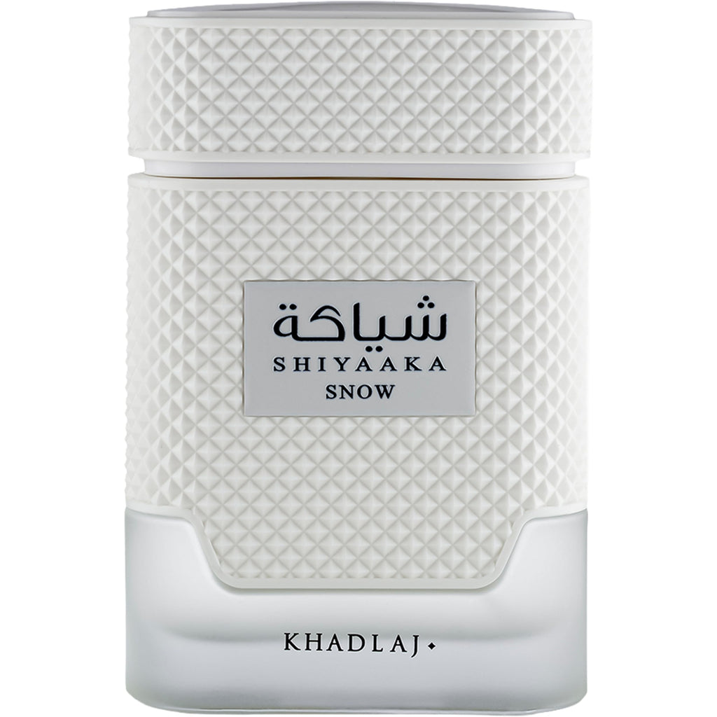 Khadlaj Shiyaaka Snow fragrance features a textured white bottle with bold Arabic lettering, conveying freshness.