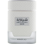 Khadlaj Shiyaaka Snow fragrance features a textured white bottle with bold Arabic lettering, conveying freshness.